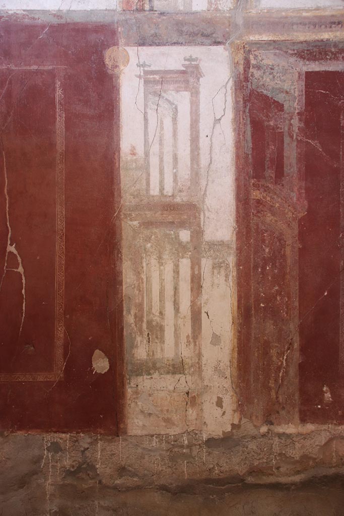 I.6.4 Pompeii. October 2024.
Room 2, painted decoration at east end of south wall. Photo courtesy of Klaus Heese.