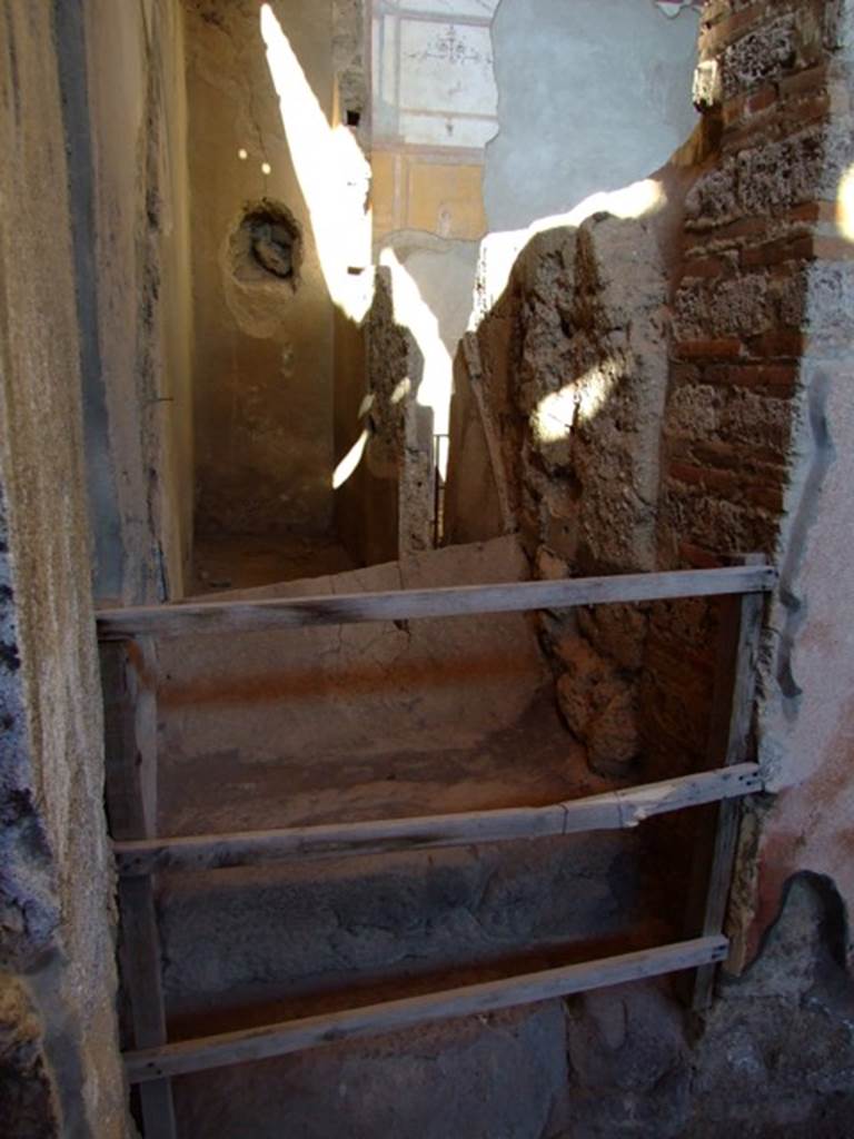 I.6.4 Pompeii. March 2009. Doorway to Room 3, Staircase to upper floor.