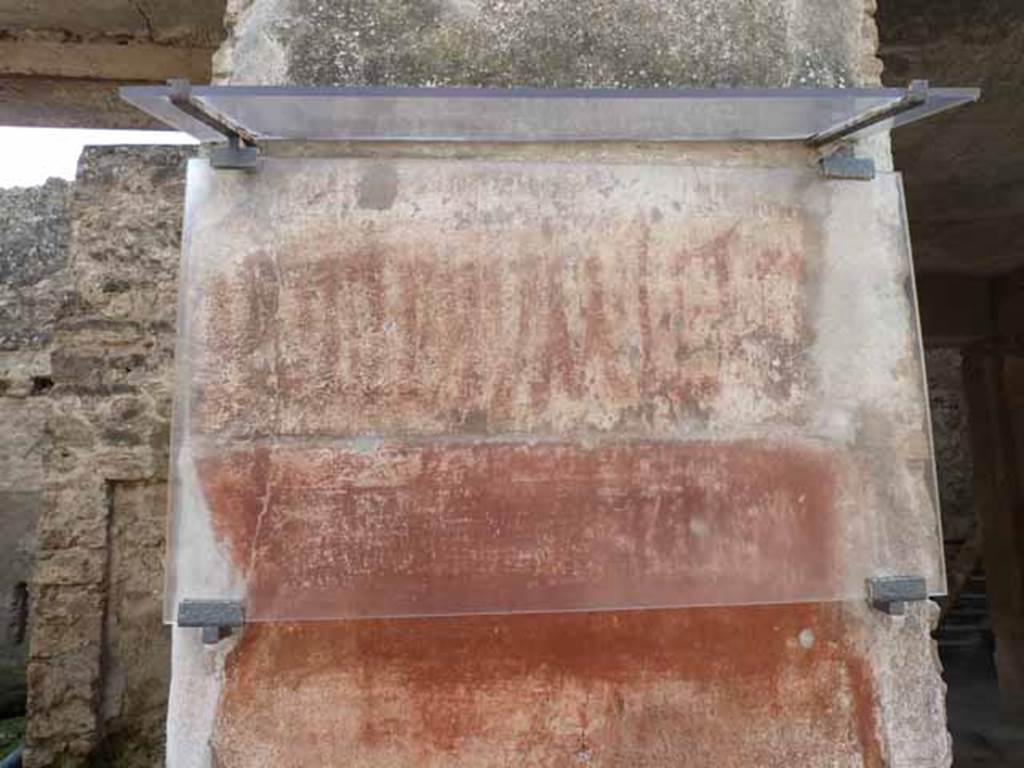 I.6.6 Pompeii. May 2010. Painted graffito on the west side of the entrance. May 2010. See Della Corte, M., 1965. Case ed Abitanti di Pompei. Napoli: Fausto Fiorentino. (p. 287) According to Della Corte, there was one electoral recommendation on the right side of the entrance that named Ingenuus. Ingenuos rog; CIL IV 7163
According to Varone and Stefani, the number of the visible painted graffito should be CIL IV 7161. CIL IV 7162 was also found on this pilaster. See Varone, A. and Stefani, G., 2009. Titulorum Pictorum Pompeianorum, Rome: L’erma di Bretschneider, (p.59)
According to Epigraphik-Datenbank Clauss/Slaby (See www.manfredclauss.de), these would have read as -
Popidium L(uci) f(ilium) aed(ilem) CIL IV 7161, see above photo.
Holconium Priscum aed(ilem) o(ro) v(os) f(aciatis) CIL IV 7162
Casellium aed(ilem) Ingenuos (!) rog(at) CIL IV 7163.