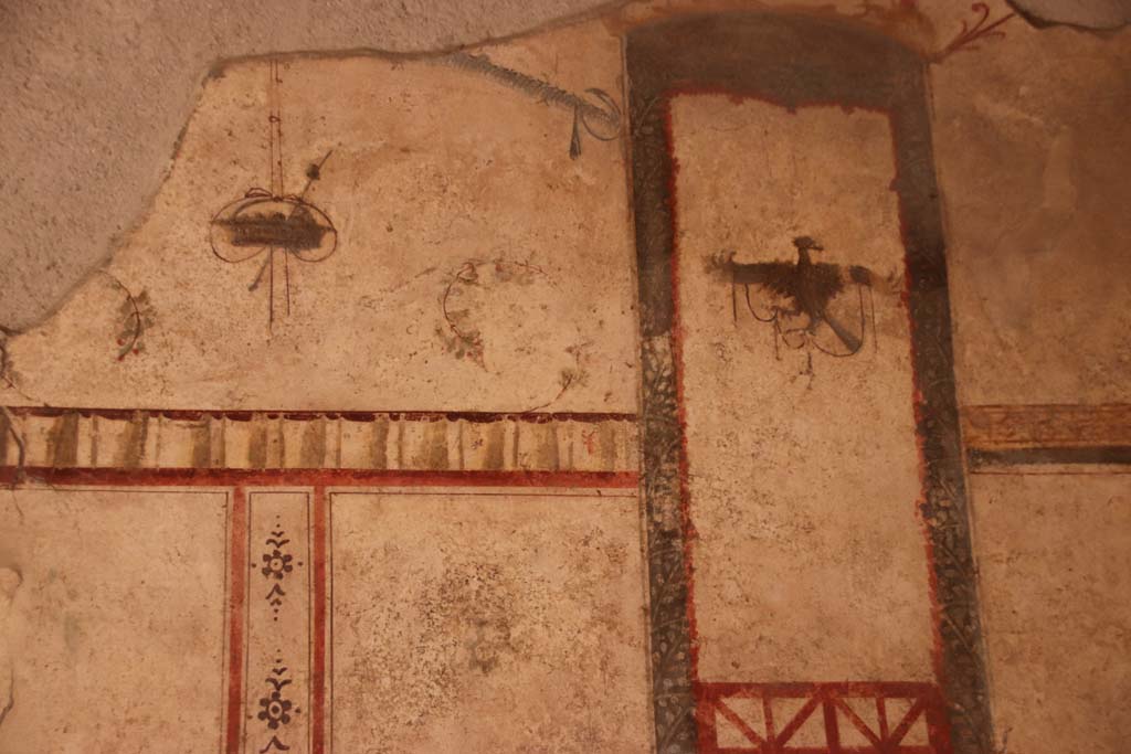 I.6.7 Pompeii. September 2019. Detail of frescoes from north end of west wall. Photo courtesy of Klaus Heese.