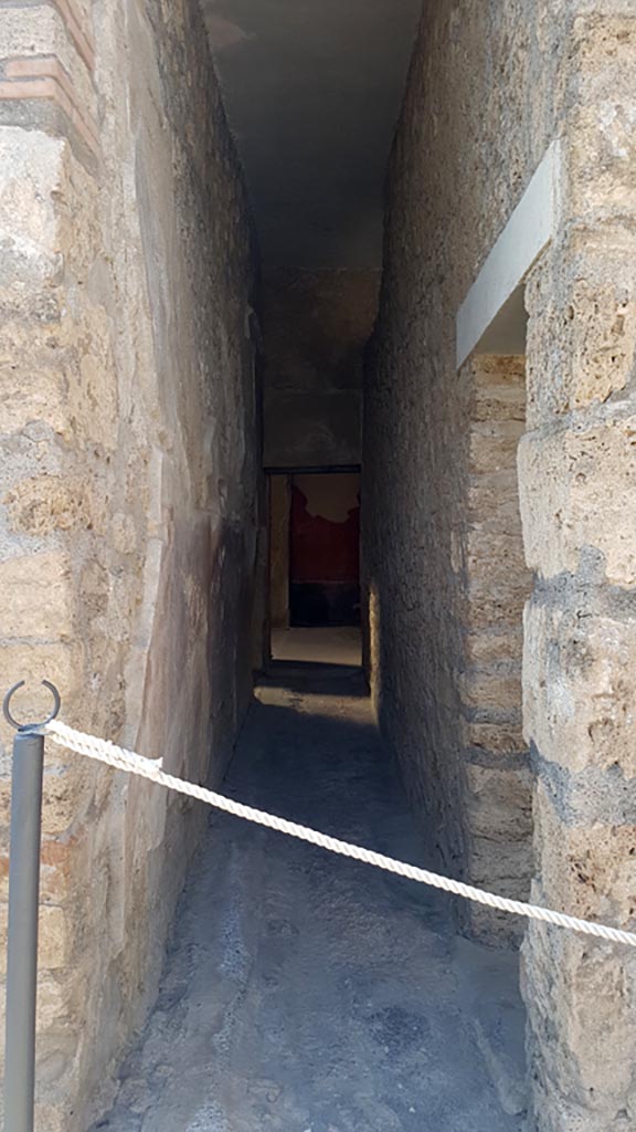 I.6.7 Pompeii. August 2023.
Looking north along corridor from garden area towards atrium.
Photo courtesy of Maribel Velasco.