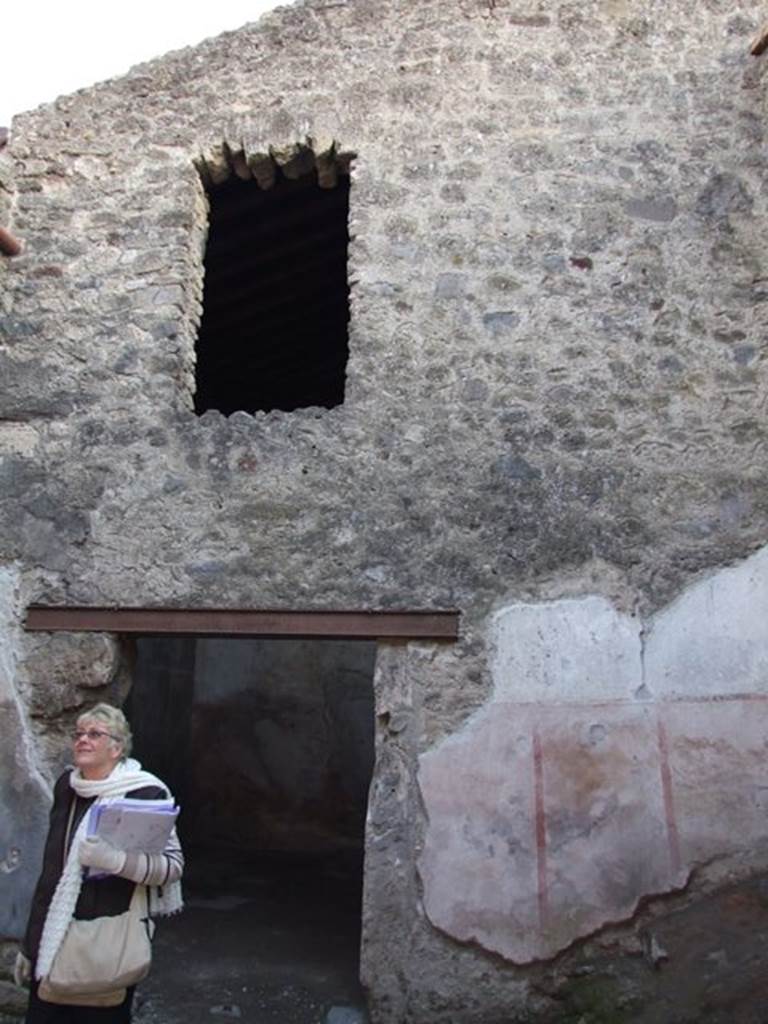 I.6.10 Pompeii. December 2007. South wall with upper storey above door to rear room.