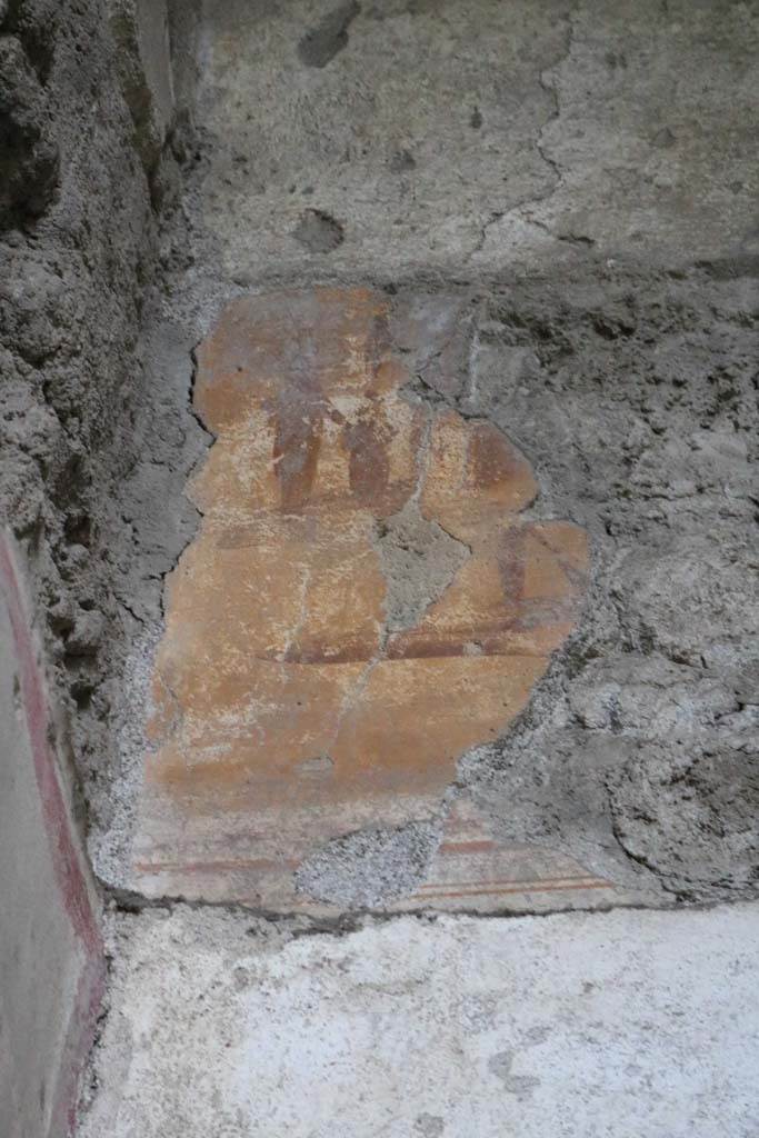 I.6.10 Pompeii. December 2018.
Detail of remaining plaster on east end of south wall. Photo courtesy of Aude Durand.