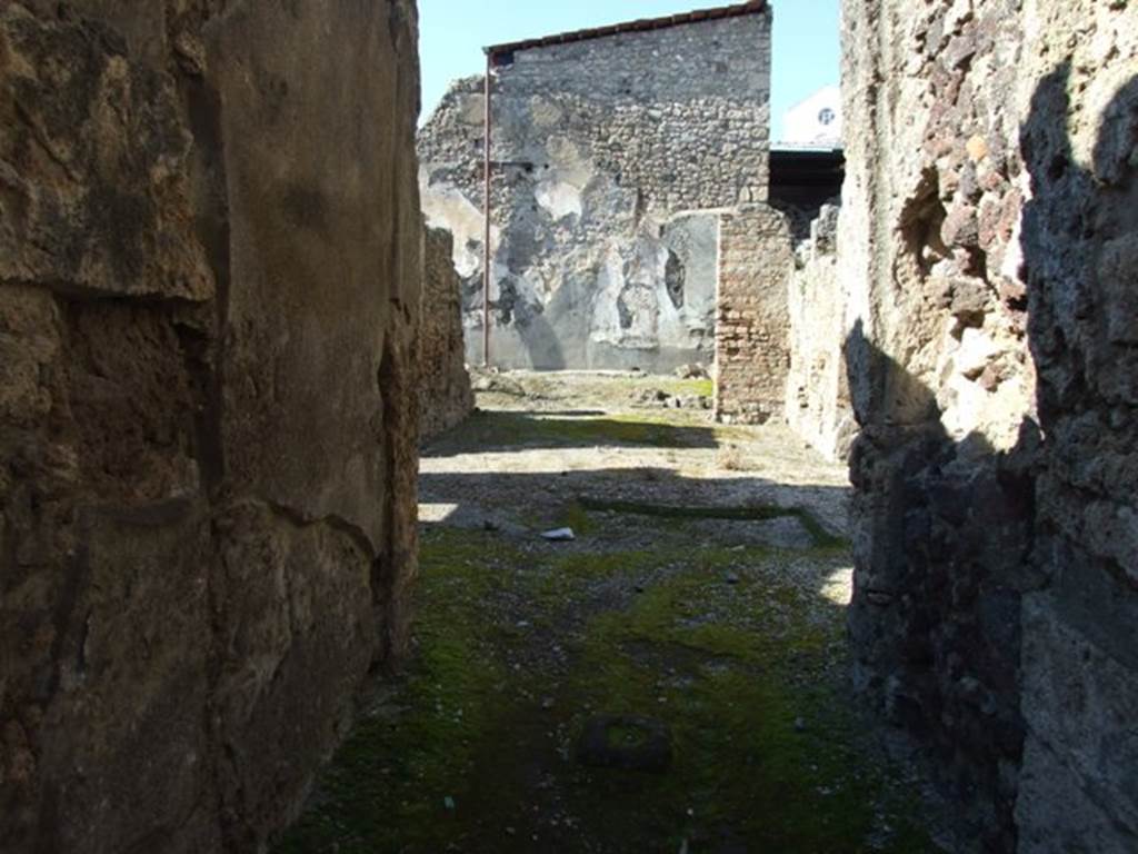 I.6.13 Pompeii. March 2009. Looking north along entrance fauces towards atrium, and tablinum.