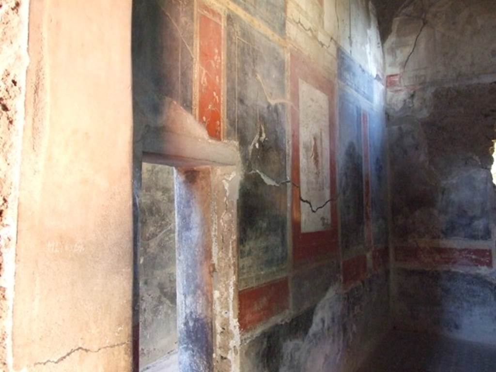 I.6.15 Pompeii. March 2009. Room 12, west wall, with doorway to corridor, room 7.