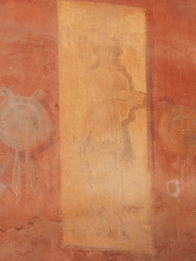 I.6.15 Pompeii. June 2019.
Room 9, painted panel on east end of north wall of small garden. Photo courtesy of Buzz Ferebee.