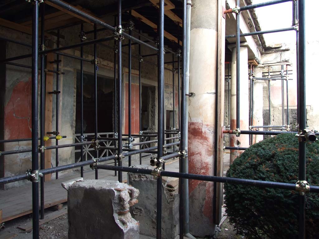 I.7.1 Pompeii. December 2006. Looking east to doorways to rooms on north side of peristyle, oecus, small room and triclinium.