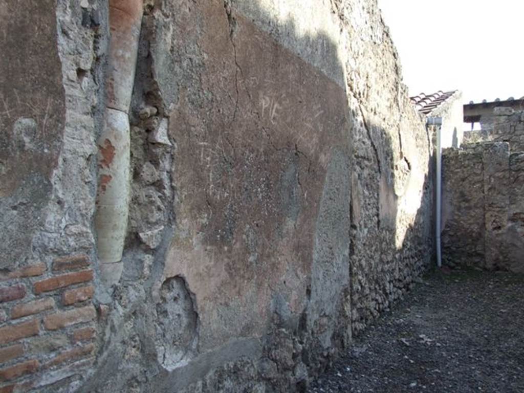 I.7.4 Pompeii. December 2007. East wall, with downpipe in north-east corner.