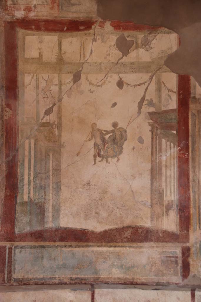 I.7.11 Pompeii. September 2021.
Painted panel at west end of north wall. Photo courtesy of Klaus Heese.