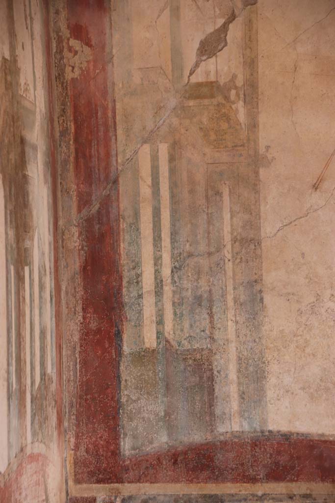 I.7.11 Pompeii. September 2021.
Detail of painted decoration from west end of north wall. Photo courtesy of Klaus Heese.