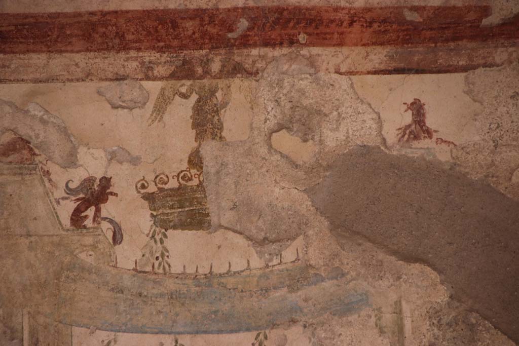 I.7.11 Pompeii. September 2021.
Detail of painted decoration from upper centre panel on north wall of triclinium. Photo courtesy of Klaus Heese.