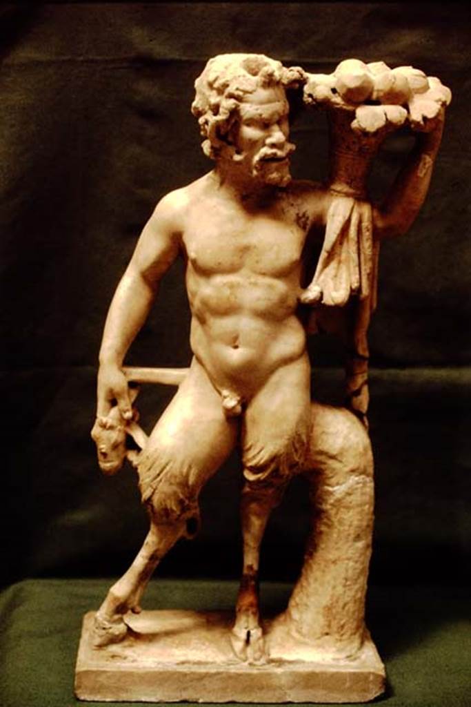 I.7.11 Pompeii, 1978. Statuette of a goat-footed pan. Photo by Stanley A. Jashemski.
Source: The Wilhelmina and Stanley A. Jashemski archive in the University of Maryland Library, Special Collections (See collection page) and made available under the Creative Commons Attribution-Non Commercial License v.4. See Licence and use details. J78f0148