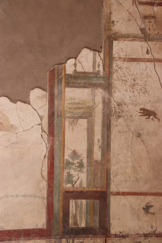 I.7.11 Pompeii. September 2021.
East wall of exedra, detail from south side of middle panel. Photo courtesy of Klaus Heese.