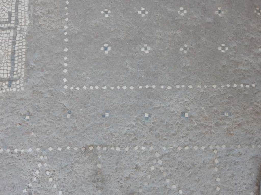 I.7.11 Pompeii. May 2017. Detail of flooring in exedra. Photo courtesy of Buzz Ferebee.