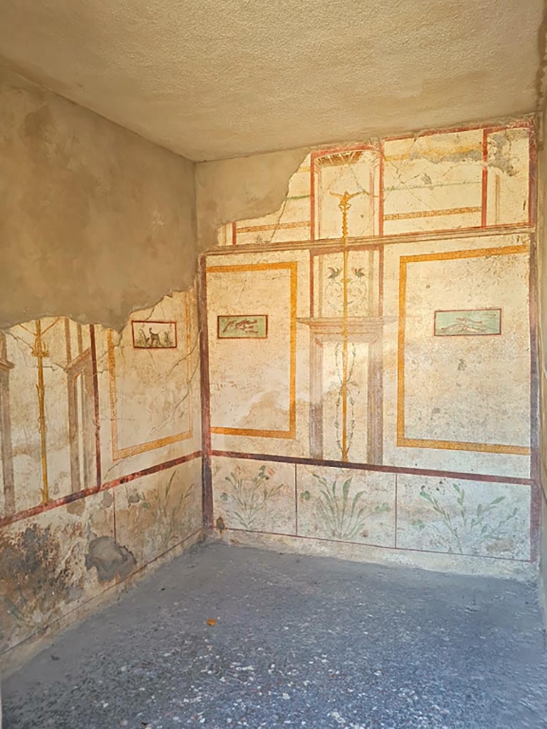 I.7.11 Pompeii. March 2024.
Looking through doorway towards east and south walls of cubiculum on south-east side of atrium.
Photo courtesy of Giuseppe Ciaramella.