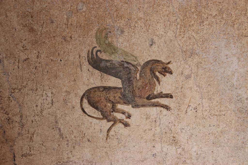 I.7.11 Pompeii. September 2021. Painting in centre of north panel on east wall. Photo courtesy of Klaus Heese.