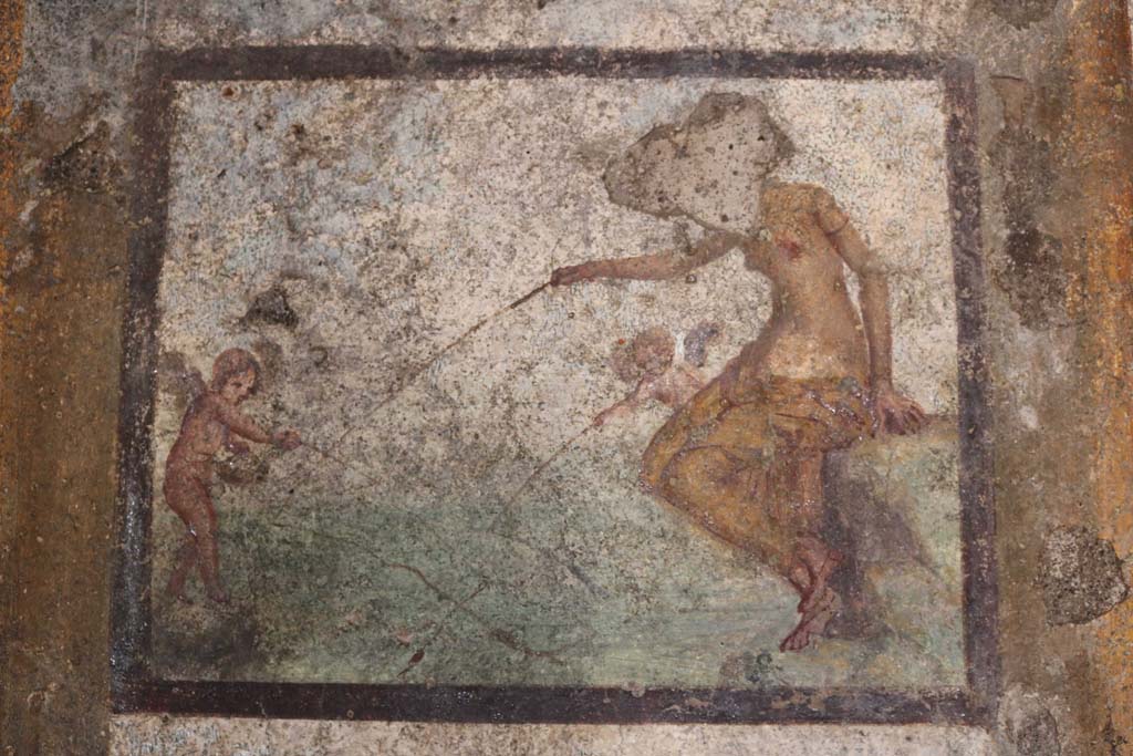 I.7.11 Pompeii. December 2018.
Wall painting of Venus or Aphrodite Pescatrice from west wall of bedroom on west side of atrium. Photo courtesy of Aude Durand.