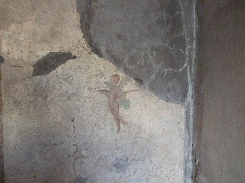 .7.11 Pompeii. December 2006. Wall painting of flying cupid from north end of west wall of bedroom on west side of atrium.