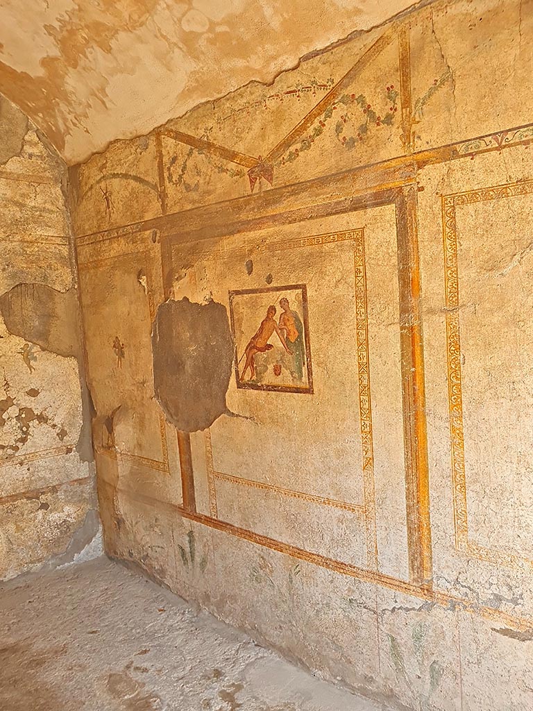 I.7.11 Pompeii. September 2024.
Looking west along north wall of cubiculum. Photo courtesy of Giuseppe Ciaramella.