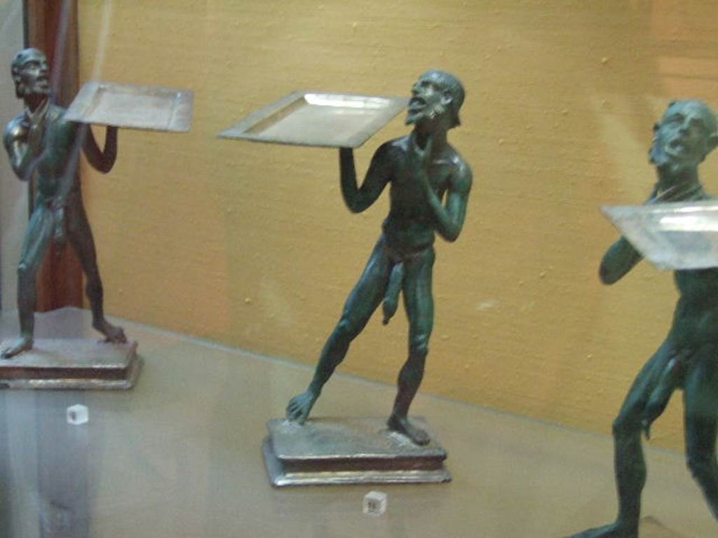 Bronze statues found in I.7.10-12. Now in Naples Archaeological Museum