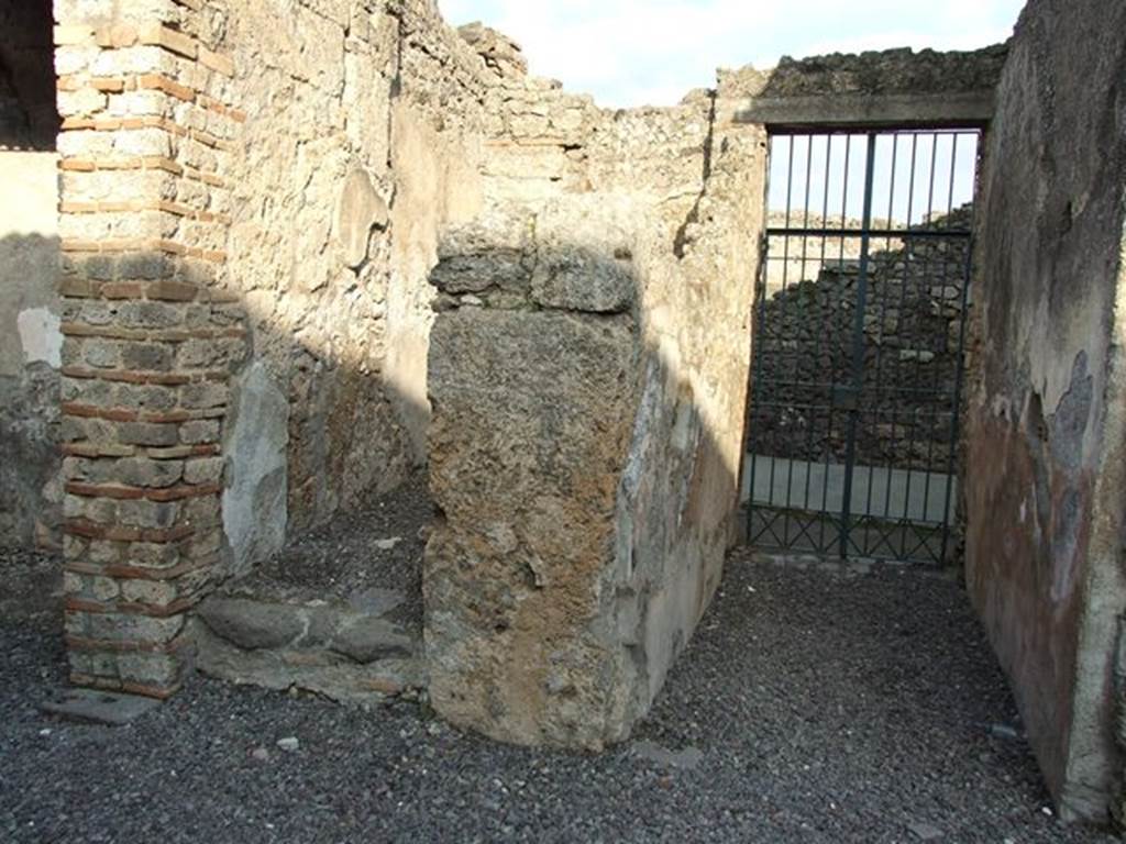 I.7.11 Pompeii. December 2006. Entrance corridor and doorway, looking east. The doorway on the left of the photo led to the stairs to the upper floor.