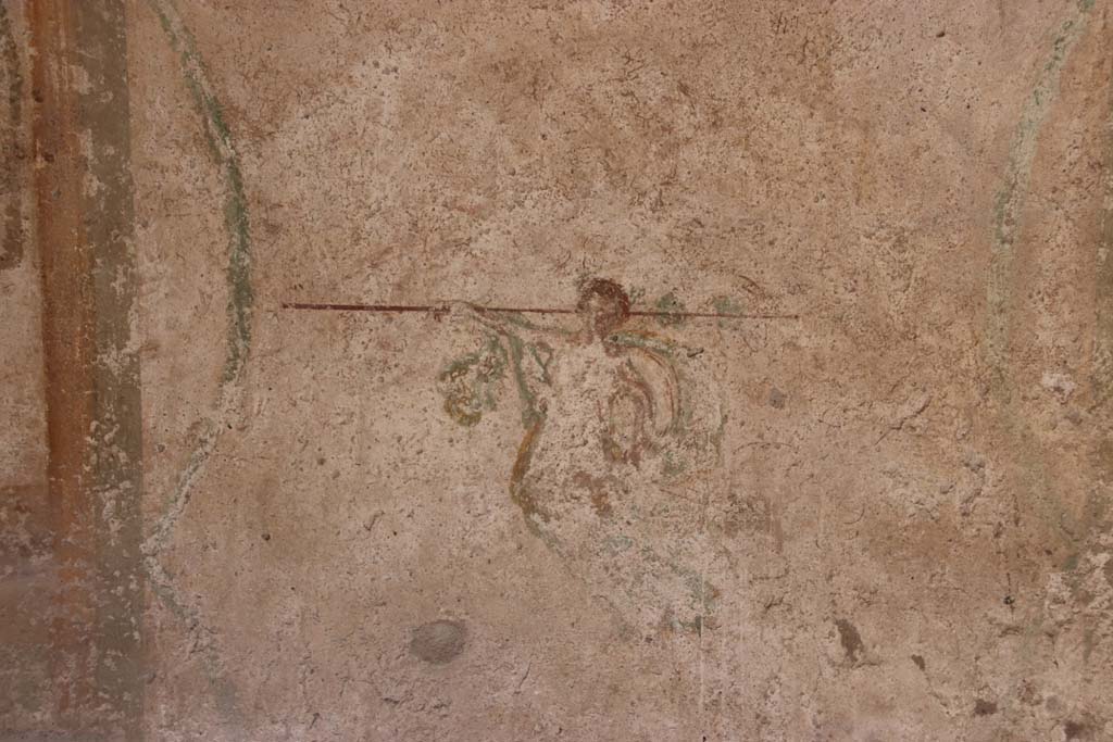 I.7.11 Pompeii. September 2021.
Painting from centre of middle panel on east wall, figure with outstretched arm. Photo courtesy of Klaus Heese.