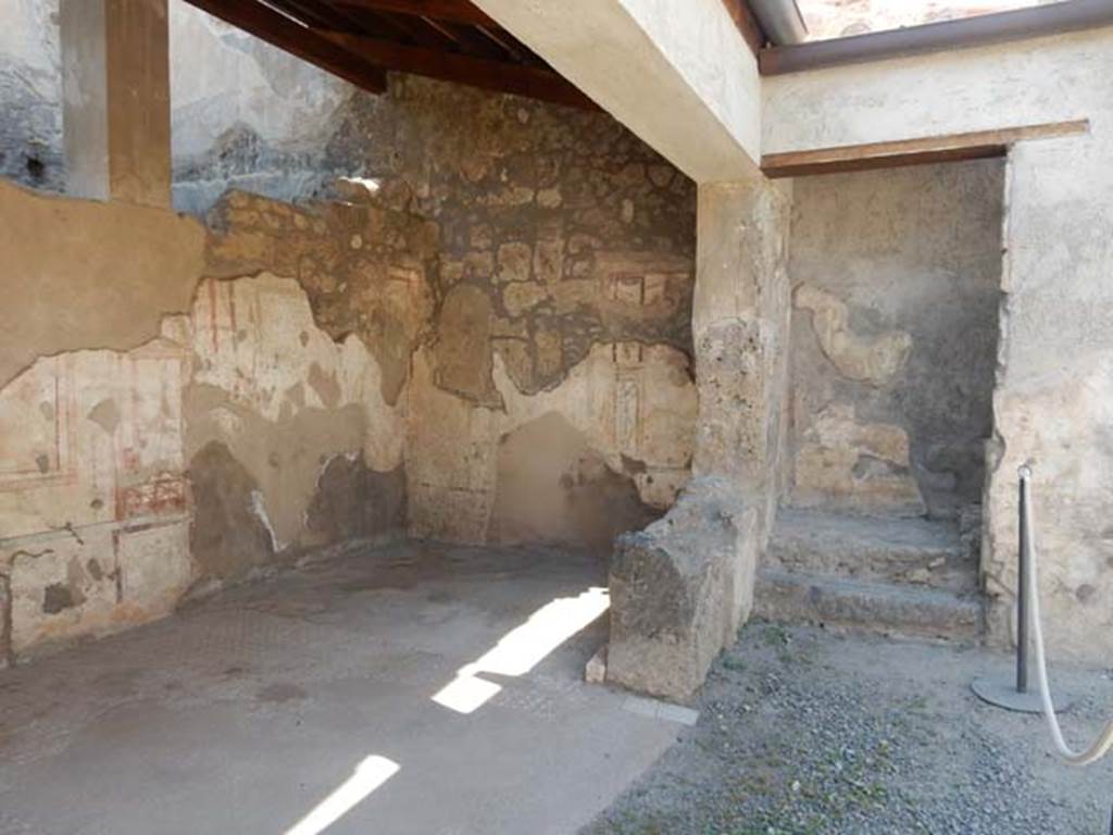 I.7.11 Pompeii. May 2017. Looking towards the north wall of tablinum, and north wall of atrium with stairs. Photo courtesy of Buzz Ferebee.