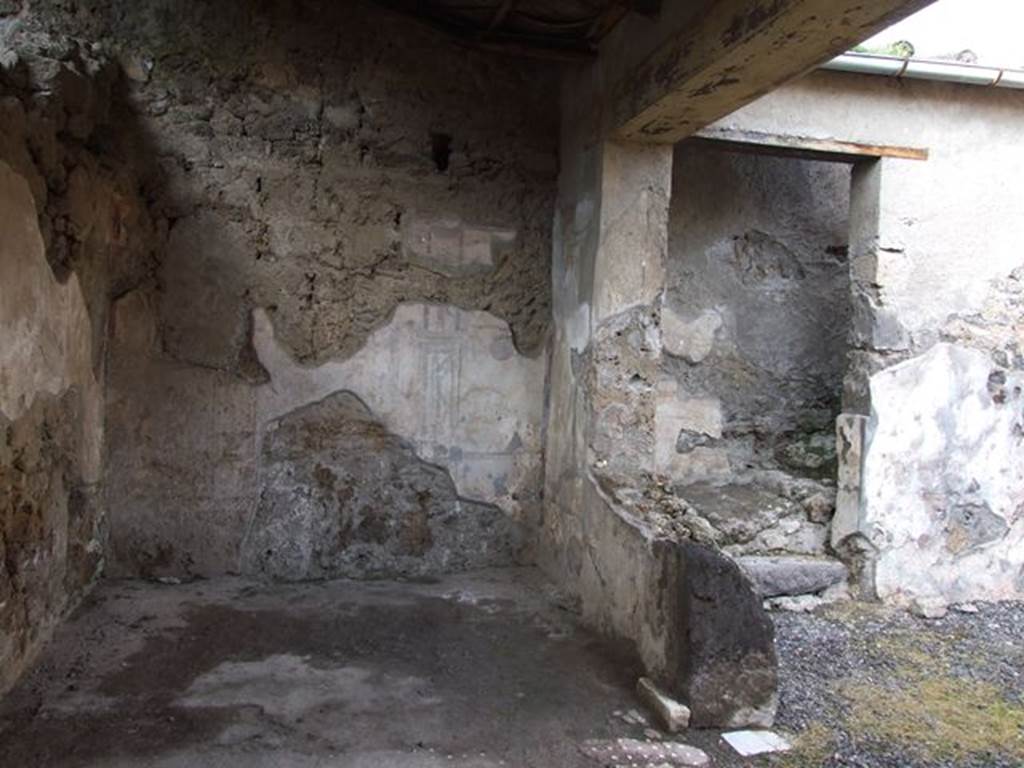 I.7.11 Pompeii. December 2006. North wall of tablinum, and north wall of atrium with stairs. Looking north. According to PPP, the central wall painting of the north wall was Andromeda and Perseus. Nothing is visible now. See Bragantini, de Vos, Badoni, 1981. Pitture e Pavimenti di Pompei, Parte 1. Rome: ICCD. (p.62, no. 107110403)