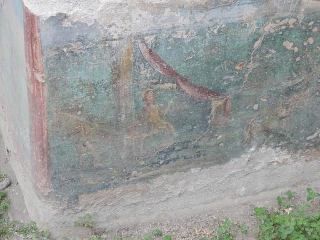 I.7.12 Pompeii. May 2017. Painted panel on inside of east summer triclinium at north end. Photo courtesy of Buzz Ferebee.