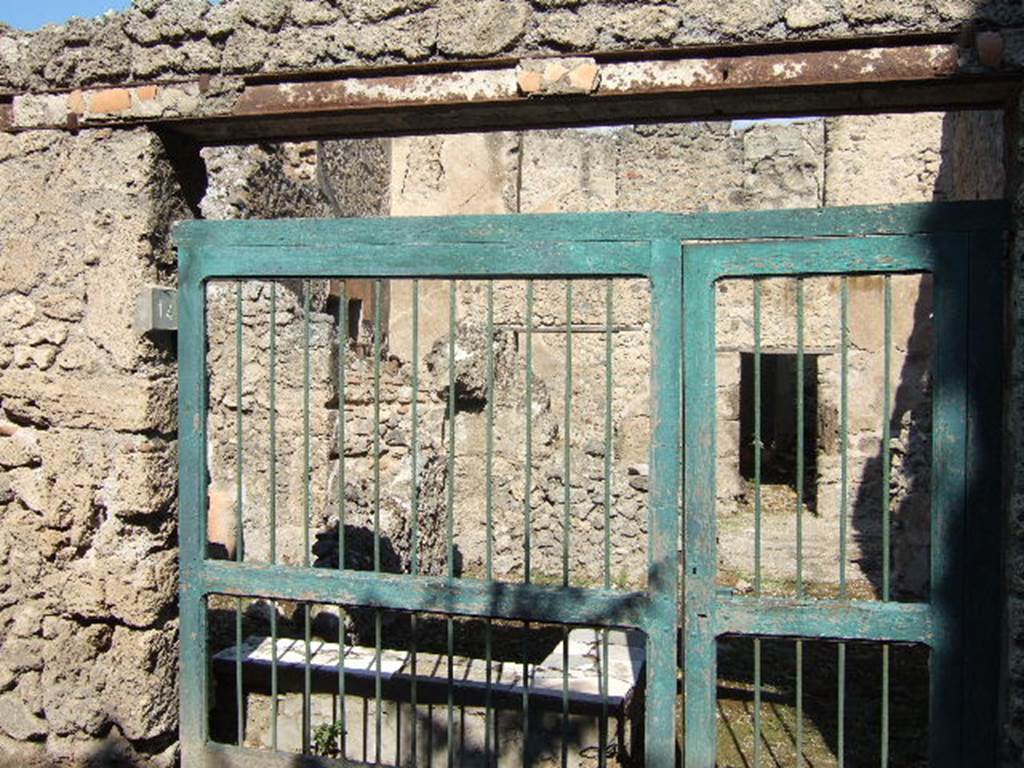 I.7.14 Pompeii. September 2005. Entrance doorway to bar, looking north. According to Della Corte, the keeper of the bar was a certain Masculus, as proved by three electoral recommendations. Two were painted on the wall to the left of the doorway, and one on the right of it �
Masculus rog(at)    [CIL IV 7238]
[Masc]u[l]us cupit    [CIL IV 7239]
Masculus cum codatis ubique (rogat)    [CIL IV 7240]
See Della Corte, M., 1965.  Case ed Abitanti di Pompei. Napoli: Fausto Fiorentino. (p.319)
According to Epigraphik-Datenbank Clauss/Slaby (See www.manfredclauss.de), these read �
Q(uintum) Postumium Proculum 
aed(ilem) d(ignum) r(ei) p(ublicae) Masculus rog(at)       [CIL IV 7238]
Ceium aed(ilem) 
[Masc]u[l]us cupit       [CIL IV 7239]
Cn(aeum) Helvium 
Sabinum aed(ilem) d(ignum) r(ei) p(ublicae) o(ro) v(os) f(aciatis) Masculus cum codatis ubiq(ue)       [CIL IV 7240]
