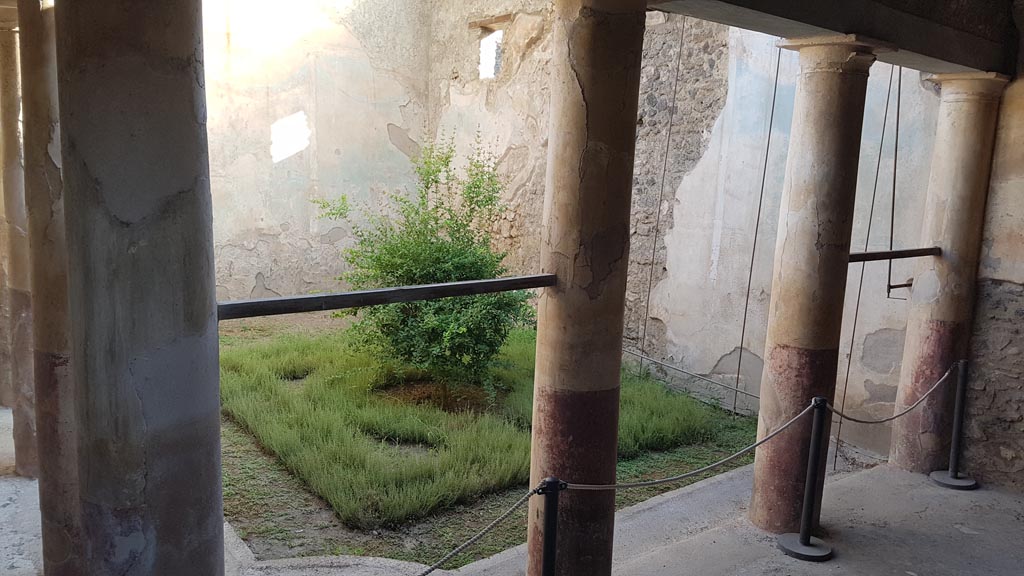 I.7.19 Pompeii. August 2023. Looking towards south and west walls of garden area. Photo courtesy of Maribel Velasco.
