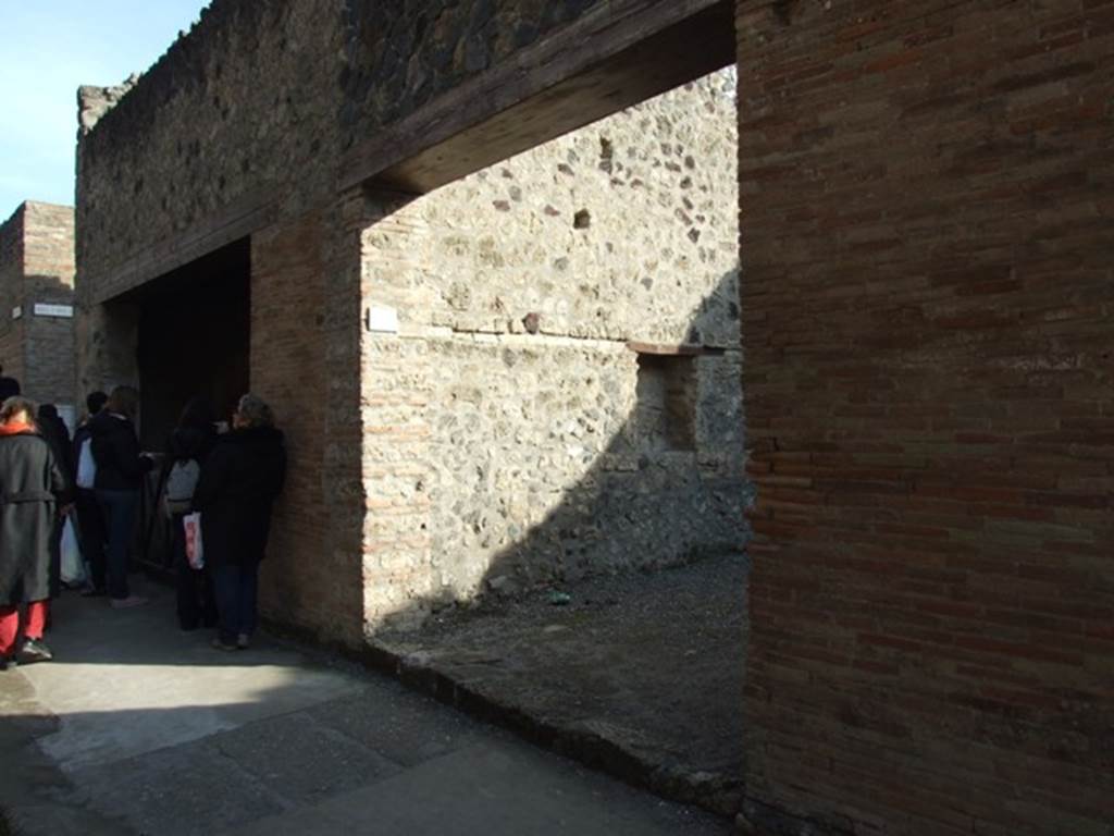 I.8.7 Pompeii. December 2007. Entrance doorway on Via dell� Abbondanza. Looking east.