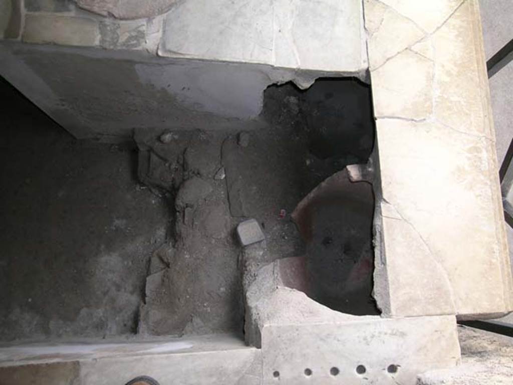 I.8.8 Pompeii. May 2003. Looking down from above counter, at north end in north-east corner. Looking west is the top of the photo. Photo courtesy of Nicolas Monteix.