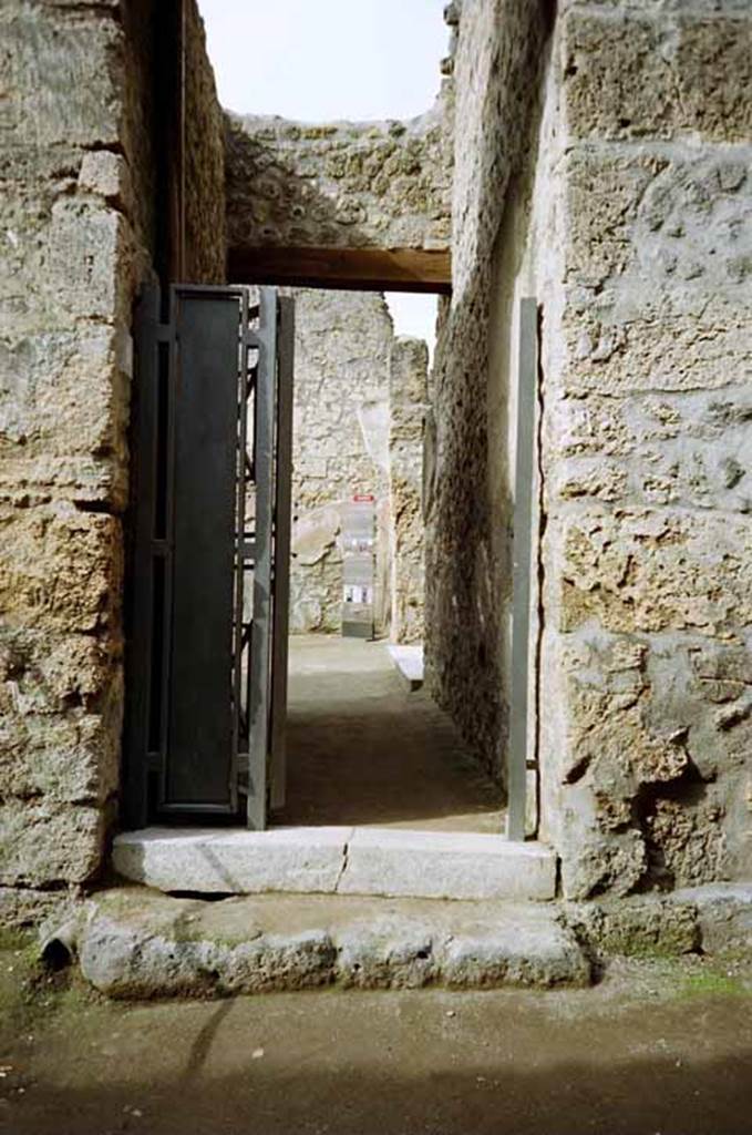 I.8.9 Pompeii. March 2010. 
Looking west to entrance doorway to house area from side roadway. Photo courtesy of Rick Bauer.

