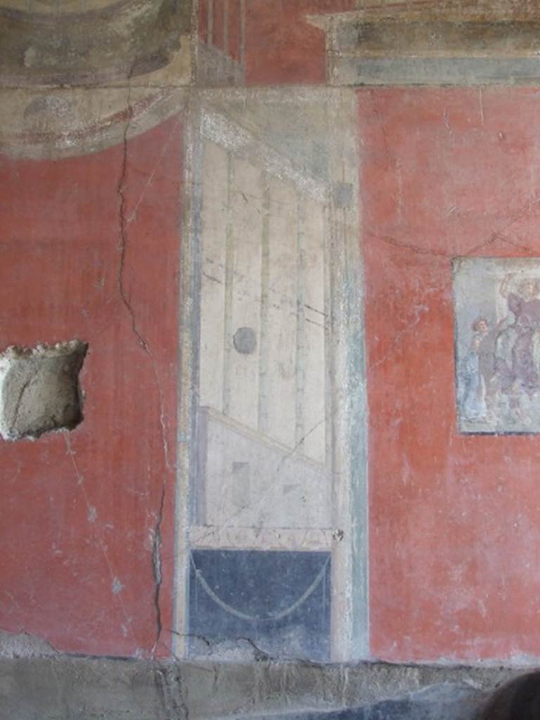 I.8.9 Pompeii. March 2009. Room 7. Triclinium. East wall. Lower level. Architectural painting at north side of central panel.