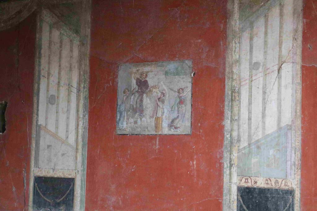 I.8.9 Pompeii. December 2018. Room 7, detail of central panel from east wall of triclinium. Photo courtesy of Aude Durand.