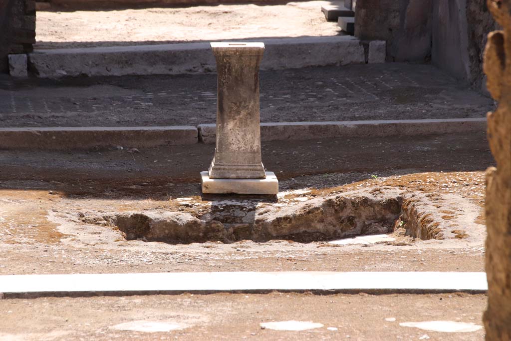 I.8.9 Pompeii. September 2019. Room 1, looking south across impluvium in atrium, towards tablinum.
Photo courtesy of Klaus Heese.
