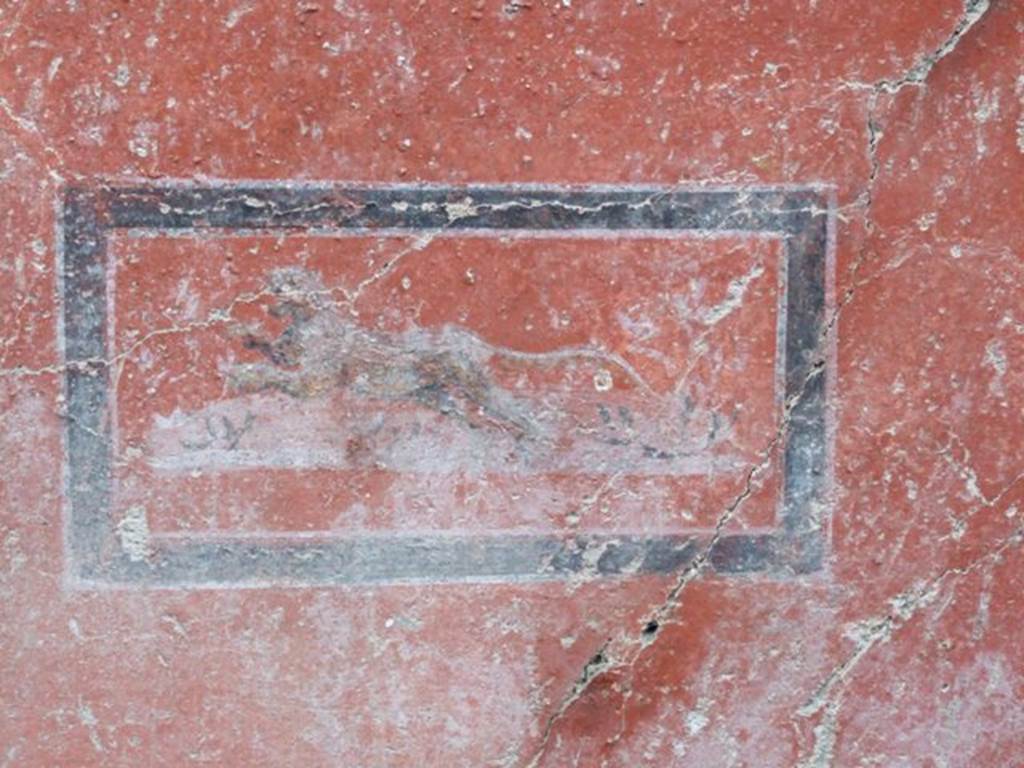 I.8.14 Pompeii. December 2007. Room 9, north wall with detail of painted panel of a leopard or panther on red central panel.

