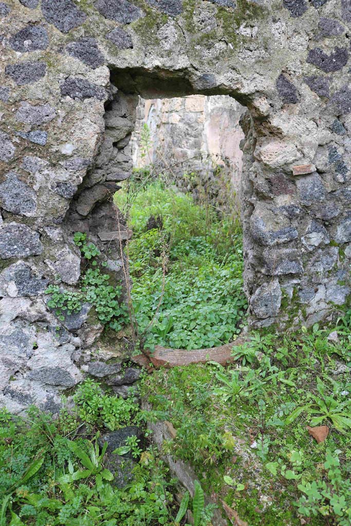 I.8.16 Pompeii. December 2018.
Looking east through hole-in-the wall into I.8.14. Photo courtesy of Aude Durand.