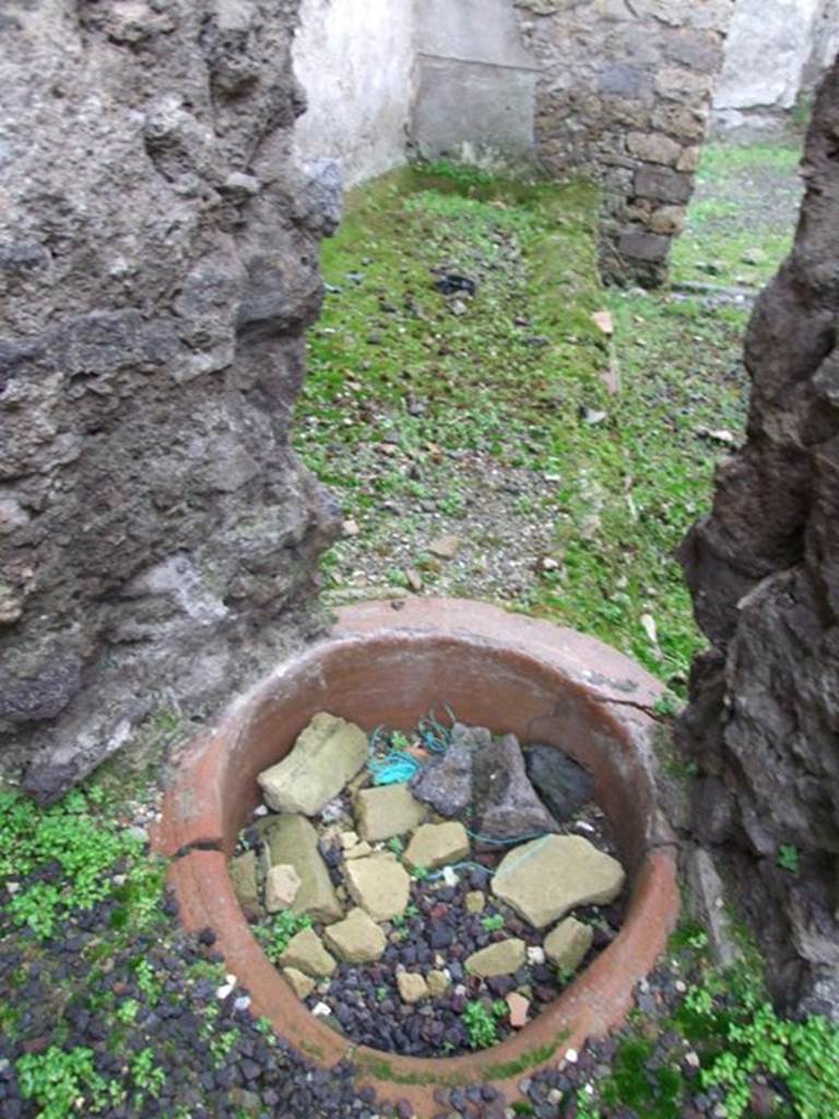 I.8.16 Pompeii, looking through a hole in the wall from I.8.14. Looking west into the open area described as a kitchen.
See Castiglione, V., Del Franco, M., and Vitale, R: “L’insula 8 della Regio I, un campione d’indagine socio-economica”, Rivista di Studi Pompeiani, Vol III, 1989, (p.185-221).