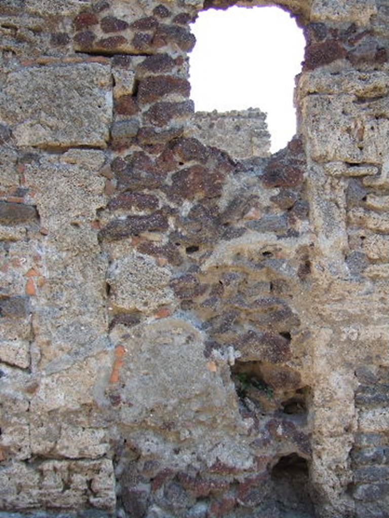 Front wall between I.8.17 and I.8.16 on Vicolo dell’ Efebo. September 2005.
