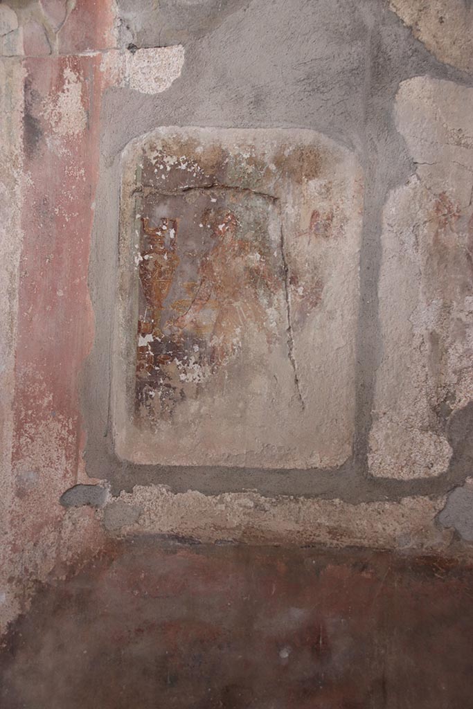 I.8.17 Pompeii. October 2024.
Room 9, central wall painting on north wall. Photo courtesy of Klaus Heese.