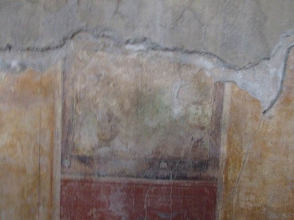 I.8.17 Pompeii. December 2007. Room 9, east wall. Remains of wall painting of Daedalus tying the wings on Icarus. See Bragantini, de Vos, Badoni, 1981. Pitture e Pavimenti di Pompei, Parte 1. Rome: ICCD. (p.84).