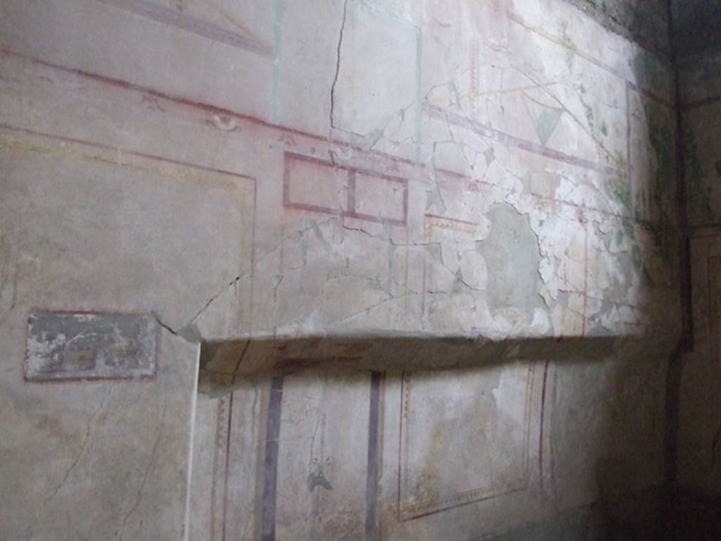I.8.17 Pompeii. December 2007. Room 14, looking west along south wall with bed recess.