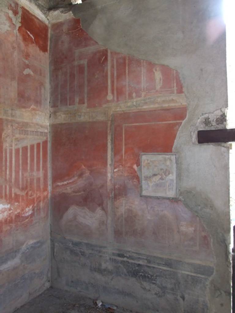 I.9.1 Pompeii. March 2009. Room 11, south wall and south-east corner. In this room the zoccolo was black with a geometric design, the middle area of the walls were red.