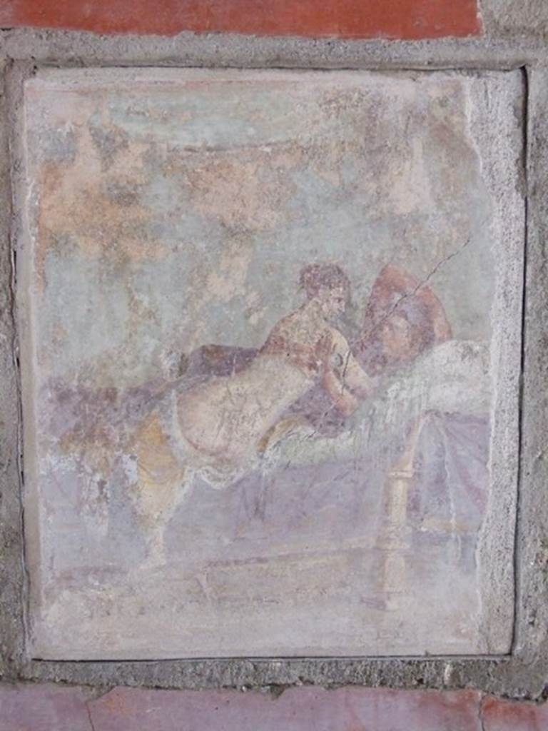 I.9.1 Pompeii. March 2009. Room 11. South wall. Wall painting of man and woman on a wooden bed.