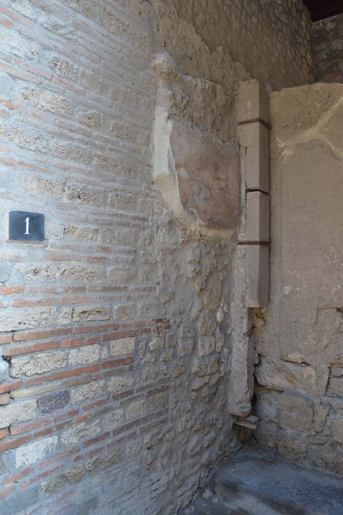 I.9.1 Pompeii. October 2017. 
East wall of entrance vestibule, with detail of wall painting of Hercules and Mercury.
Foto Taylor Lauritsen, ERC Grant 681269 D�COR.
