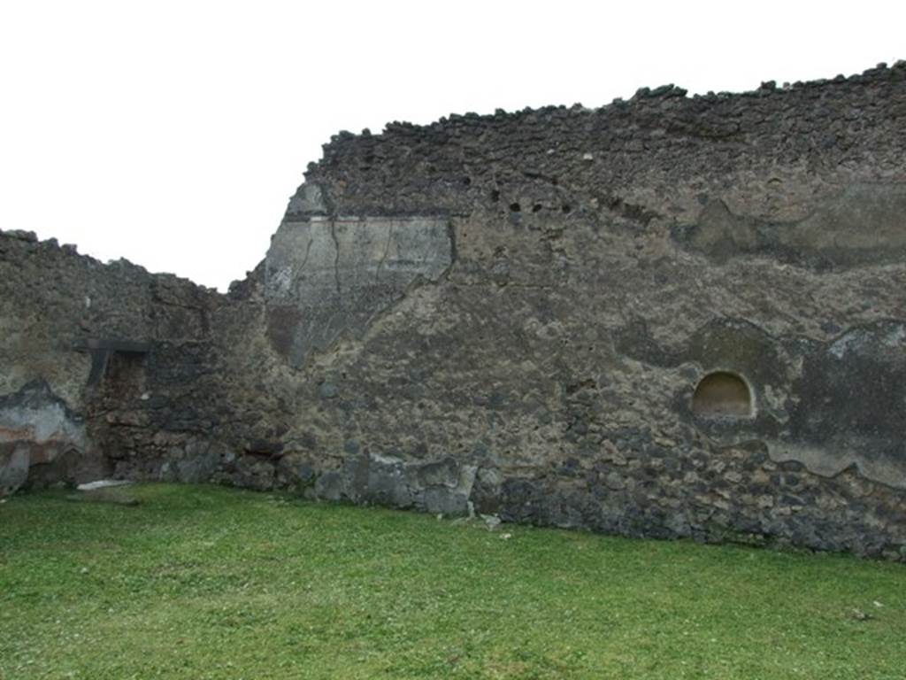 I.9.3 Pompeii. March 2009. Room 6, west wall of garden area, and doorway in south-west corner to room 7.