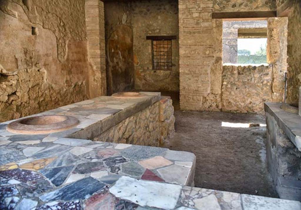 I.9.4 Pompeii. April 2018. Looking south across bar-room. Photo courtesy of Ian Lycett-King.
Use is subject to Creative Commons Attribution-NonCommercial License v.4 International.