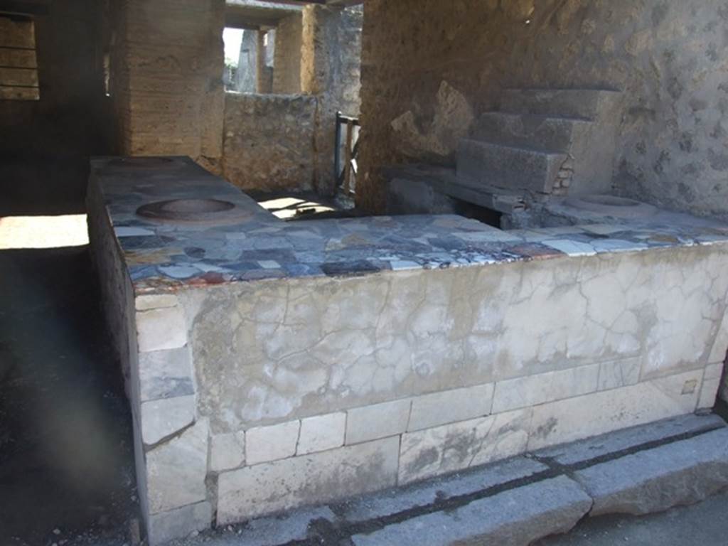 I.9.4 Pompeii. March 2009. Marble counter.